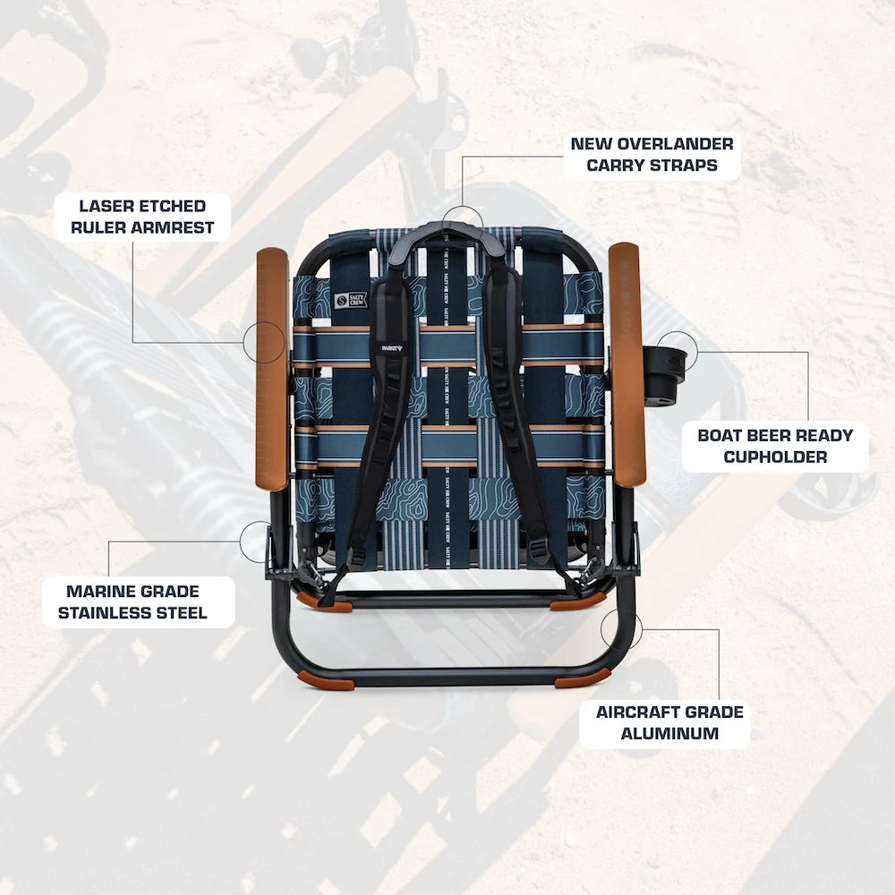 PARKIT x Salty Crew Voyager Chair in limited-edition topo-map pattern, featuring woven webbing, black steel frame, wooden armrests, built-in cooler, cup holder, and backpack straps, rugged 3-in-1 outdoor chair built for surf, fish, and adventure.